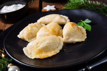 Polish Christmas pierogi with sauerkraut and mushrooms