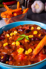 chili con carne with sweet potato and spicy nachos