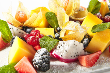 Exotic Fruit Plate or Vegan Platter with Sliced Fruits and Berries