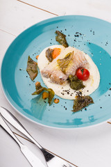 Cooked white fish fillet served with mashed potatoes