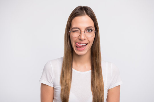 Photo of funky lady tempting lick lips and blink eye wear specs and t-shirt isolated white background