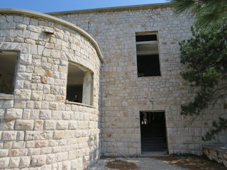 Fototapeta na wymiar door in old house Abandon prison Goli otok croatia