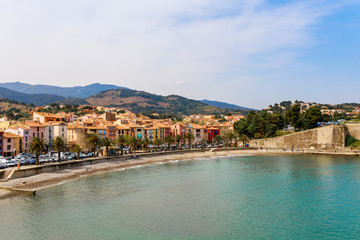 Panorama of Collioure harbour, Languedoc-Roussillon, France, South Europe. Ancient town with old castle on Vermillion coast of French riviera. Famous tourist destination on Mediterranean sea