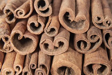 Fragrant cinnamon sticks close up background