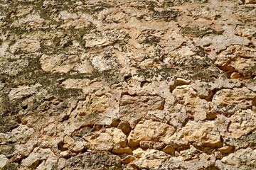 Détail de mur de pierre ancien.