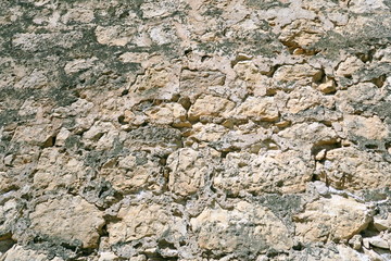 Détail de mur de pierre ancien.