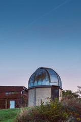 Fototapeta na wymiar small observatory with blue sky