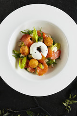 Beautiful Restaurant Plate of Trout Fillet 48 Degrees and Egg Poached with Warm Potatoes Top View