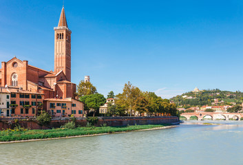 Fototapeta premium Panoramic cityscape aerial view on Verona historical center, bridge and Adige river. Famous travel destination in Italy. Old town where lived Romeo and Juliet from Shakespeare story