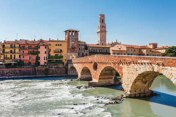 Obraz premium Panoramic cityscape aerial view on Verona historical center, bridge and Adige river. Famous travel destination in Italy. Old town where lived Romeo and Juliet from Shakespeare story