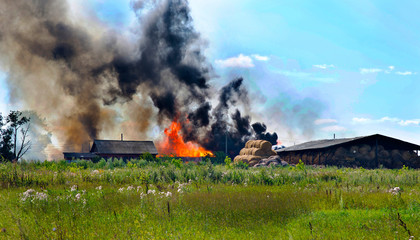 burning agricultural warehouses © Artem