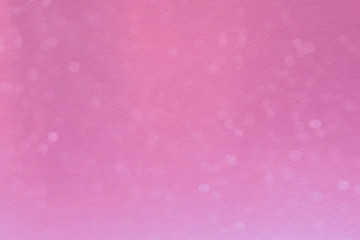 Abstract blurred bokeh on pink background