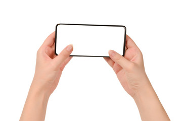Smart phone in woman hands isolated on white background.  White screen. Copy space.
