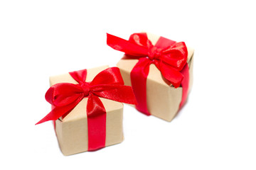 Obraz premium New Year. New Year's gifts tied with a red ribbon. Gifts for the most beloved.