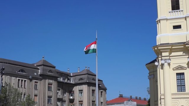 Hungarian flag waving in the wind in Debrecen