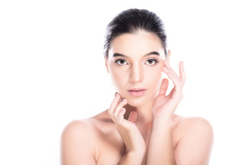Beauty woman face isolate in white background. Young caucasian girl, perfect skin, cosmetic, spa, beauty treatment concept. Fingers touching jaw.