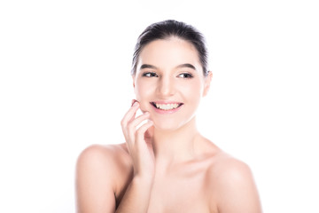 Beauty woman face isolate in white background. Young caucasian girl, perfect skin, cosmetic, dental, beauty treatment concept. Happy smile.