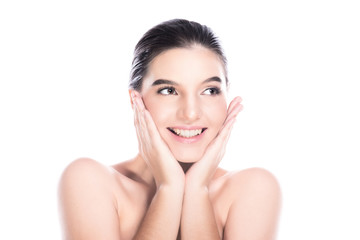Obraz na płótnie Canvas Beauty woman face isolate in white background. Young caucasian girl, perfect skin, cosmetic, dental, beauty treatment concept. Hand on face, big happy exciting smile.