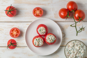 Tomatoes stuffed with shrimp. Belgian national snack. The view from the top. Copy space.