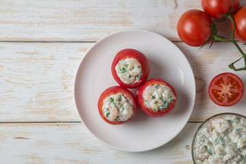 Tomatoes stuffed with shrimp. Belgian national snack. The view from the top. Copy space.