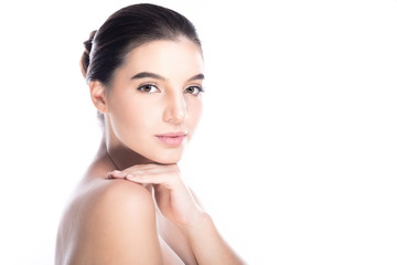 Beauty woman face isolate in white background. Young caucasian girl, perfect skin, cosmetic, spa, beauty treatment concept. Side shot, hand on shoulder, smile.