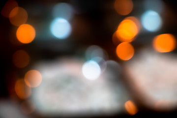 Light abstract bokeh background by blur or defocused at light element use for background or wallpaper in new year diwali christmas marriage celebration