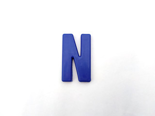 plastic alphabet letters isolated on white background