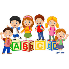 Happy school children with alphabet blocks