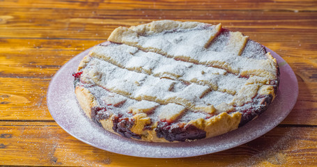 Sprinkled powdered sugar homemade blueberry pie