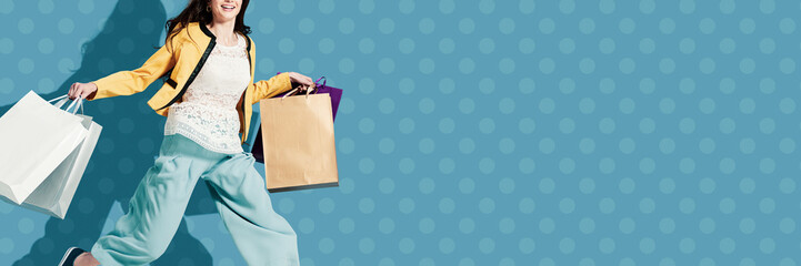 Cheerful happy woman enjoying shopping