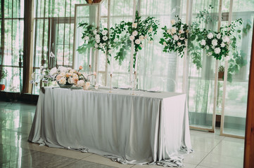 Head table for the newlyweds at the wedding hall.