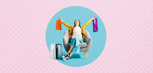 Naklejka na ściany i meble Cheerful shopaholic woman with shopping bags