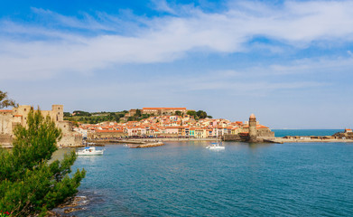 Panorama of Collioure harbour, Languedoc-Roussillon, France, South Europe. Ancient town with old castle on Vermillion coast of French riviera. Famous tourist destination on Mediterranean sea