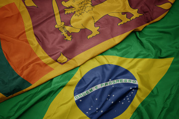 waving colorful flag of brazil and national flag of sri lanka.