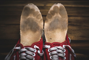 The soles are dirty and very old.