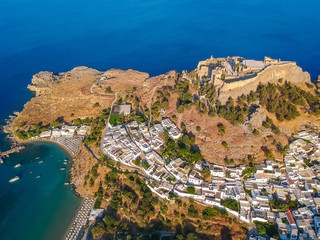 Aerial birds eye view drone photo of village Lindos, Rhodes island, Dodecanese, Greece. Sunset...
