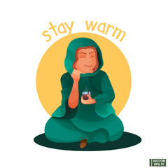 Girl with a mug of tea wrapped herself in a plaid