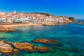 Sea landscape with Calella de Palafrugell, Catalonia, Spain near of Barcelona. Scenic fisherman village with nice sand beach and clear blue water in nice bay. Famous tourist destination in Costa Brava