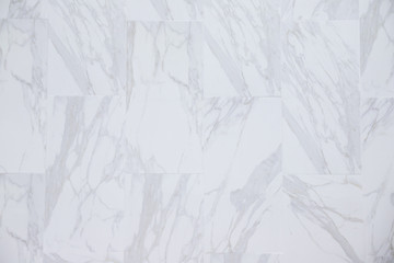 white marble tiles background and texture. white stone wall or floor.