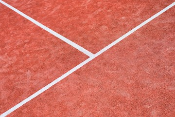 Fototapeta premium Photo of red tennis court