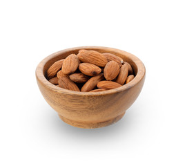 Almond. Nuts in wooden cup isolated on white background