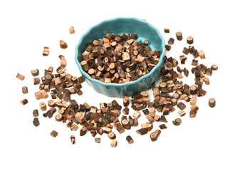 Cinnamon twig chinese herbal medicine on a white background pestle over white background. Gui zhi.