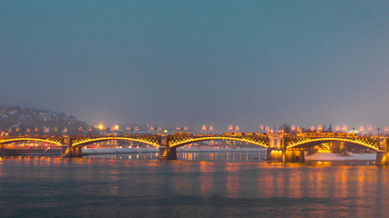 Margit bridge on a winter night in Budapest.