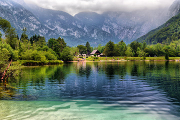 Panoramic view of Lake Bohinj, the largest permanent lake in Slovenia. It is located within the Bohinj Valley of the Julian Alps