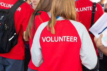 Young people volunteers at a briefing