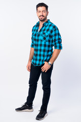 Fototapeta premium Full body shot of young handsome bearded hipster man