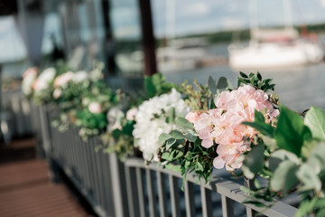 background image of beautiful flowers in a street cafe