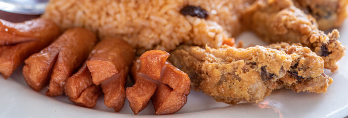 Fast food with fried chicken and hot dog with rice, healthy care concepts.