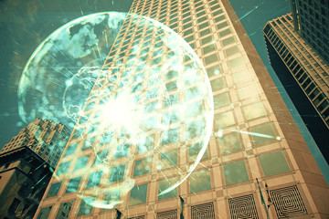 Double exposure of business theme hologram drawing and city veiw background. Concept of success.