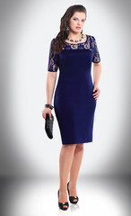 in full growth. fashionable young woman in elegant evening dress